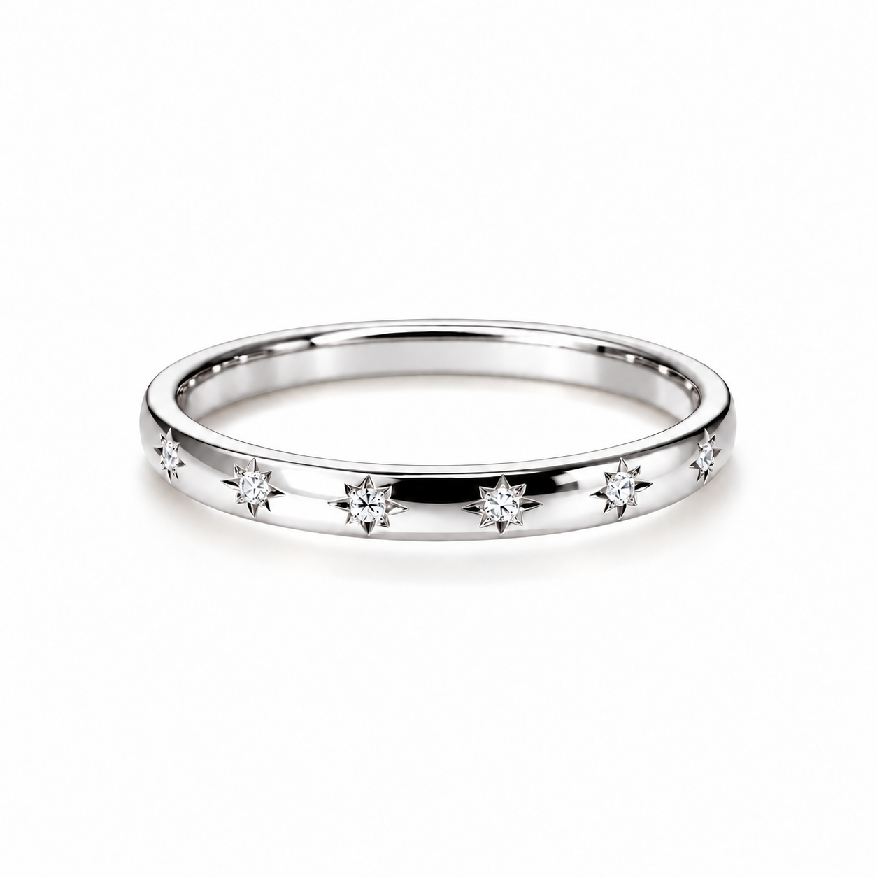 Hidden in the Stars ashes ring in polished white gold with star-set diamonds, shown on a white background.